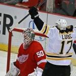 Milan Lucic beat Red Wings goalie Jonas Gustavsson early in the third period to tie the game at 2-2.
